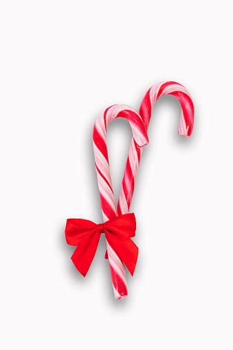 Two Candy Canes With Bow On White Background Stock Photo Download