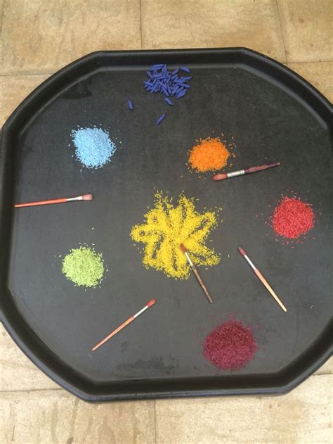 Sensory Play With Coloured Rice Making Firework Patterns Bonfire