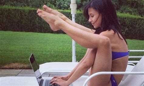 Hilaria Baldwin Performs Challenging Yoga Pose While Typing Daily