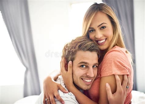 Her Smile Inspires Mine A Happy Young Couple Sharing An Affectionate