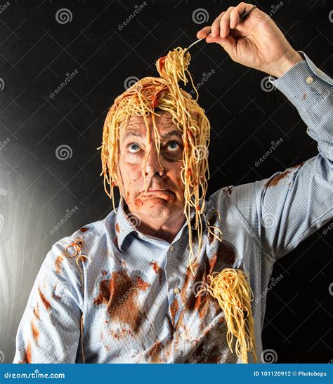 Man Eating Spaghetti With Tomato Sauce In Head Stock Photo Image Of Stained Greasy