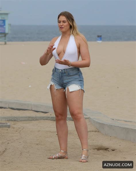 Iskra Lawrence Flashes Her Sideboob In White Swimsuit For Photoshoot On