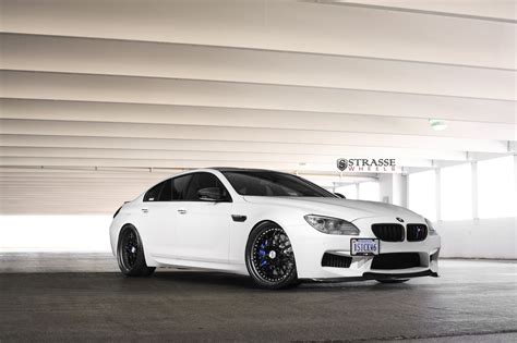 White Bmw 6 Series Wearing Black Rims Featuring Blue Calipers — Carid