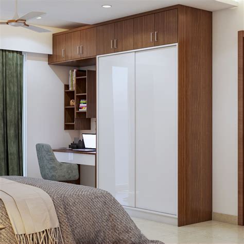 Compact 2 Door Wardrobe Design With Wooden Loft Storage Livspace