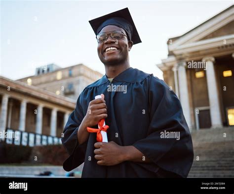 University Diploma Graduation And Portrait Of A Black Man At Campus To