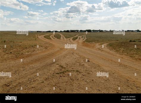 Crossroads Of Rural Roads In A Field Stock Photo Alamy