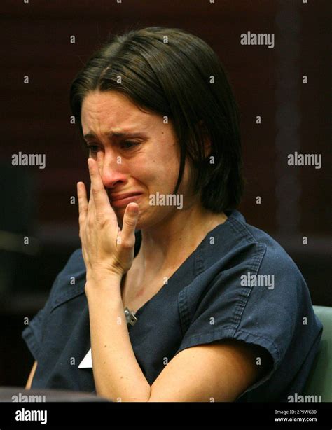 Casey Anthony Wipes Tears From Her Eyes At A Bond Hearing At The Orange County Courthouse In
