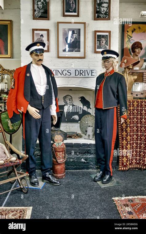Antique Shop Interior With Antique Items And 1800s Military Uniforms At