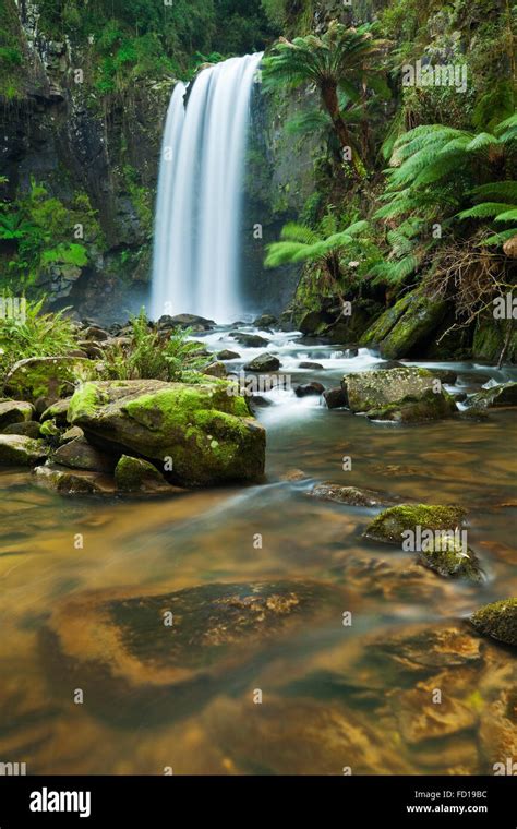 Waterfall In A Lush Rainforest Photographed At The Hopetoun Falls In