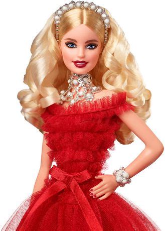 Her floral dress is accented with a pretty colorful sash. 2018 Holiday Barbie Doll -- Blonde Hair | Walmart Canada