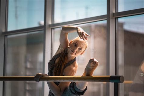 Young Woman Doing Stretching On Ballet Barre Stock Image Image Of