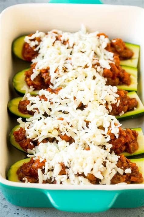 Stuffed zucchini boats with the flavor of chicken parmesan. Stuffed Zucchini Boats - Dinner at the Zoo