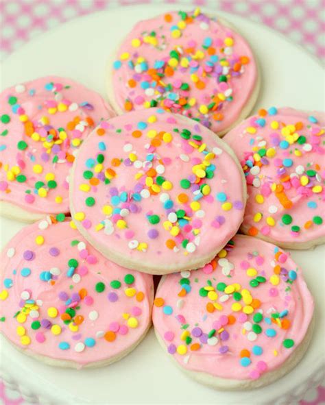 In a large bowl, cream together the butter, sugar, and cream cheese with an electric hand mixer on high speed for about 5 minutes, until fluffy and the sugar is mostly dissolved. Copycat Grocery Store Sugar Cookies | TheBestDessertRecipes.com