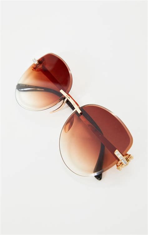 brown faded round frame frameless sunglasses prettylittlething