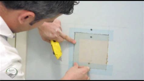 Use sharp scissors to cut a wall repair patch so that it is approximately 1 in (2.5 cm) taller and 1 in (2.5 cm) wider than the hole in the wall. How 2-For U: Drywall Repair - Patching a large hole in your wall. - YouTube