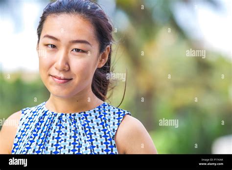 Close Up Of Asian Woman Smiling Outdoors Stock Photo Alamy
