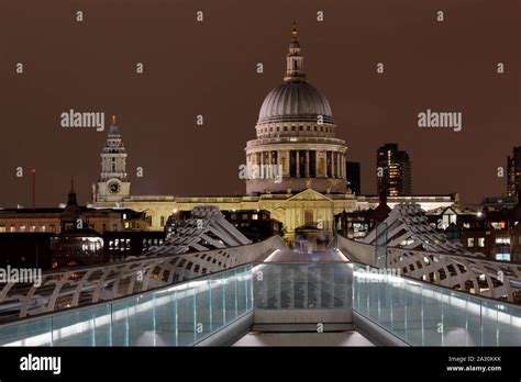 The Millennium Bridge And Saint Pauls Cathedral London England At
