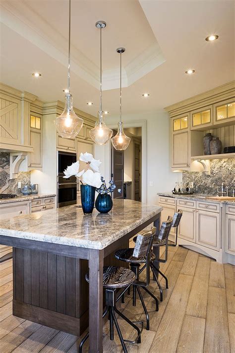 Upscale French Country Elegance With A Stone Topped Island Sleek Glass