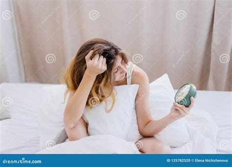 Shocked Young Woman Waking Up With Alarm Stock Photo Image Of Young