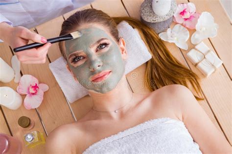 The Young Woman In Spa Health Concept With Face Mask Stock Image