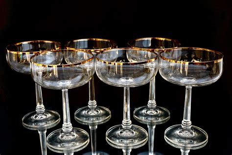 Vintage Gold Rim Champagne Coupe Glasses Set Of 4 Etsy Champagne Coupe Glasses Gold Rims