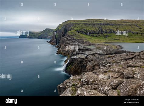 Bosdalafossur Waterfall And Coastline Long Exposure Faroe Islands