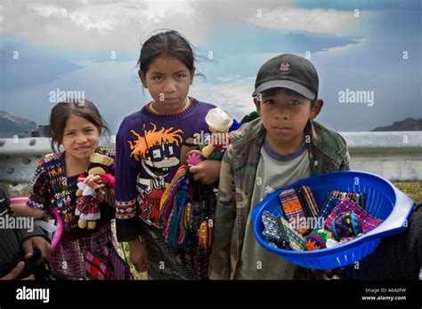 Mayan Children Selling Weaving Above Lake Atitlan Near Panajachel