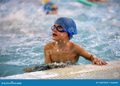 Children Swimming Competition In Pool Relay Race Stock Photo Image