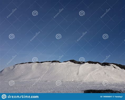 Black Mountains White Snow And Blue Sky Stock Image Image Of Cloud
