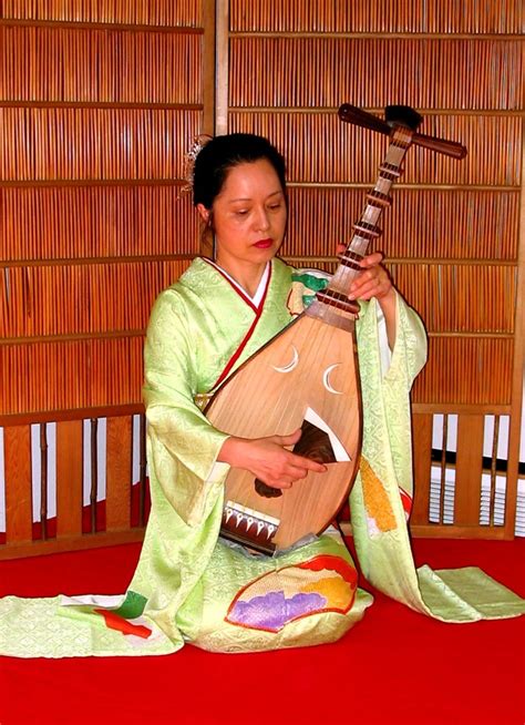 The Instrument Is A Biwa Or Short Necked Lute Chinese Music