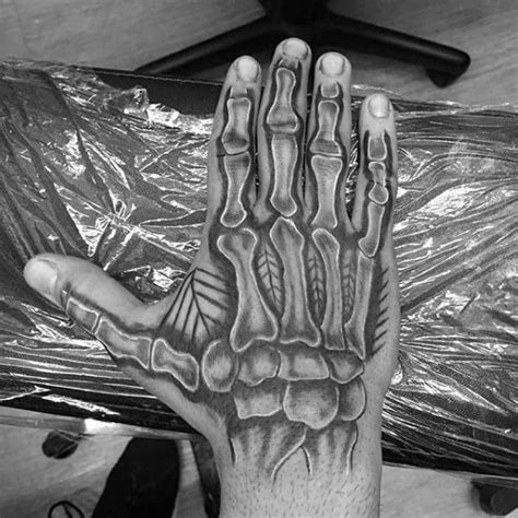 He had received it during the time of halloween and had revealed it during one direction's take me home tour. 75 Skeleton Hand Tattoo Designs For Men - Manly Ink Ideas