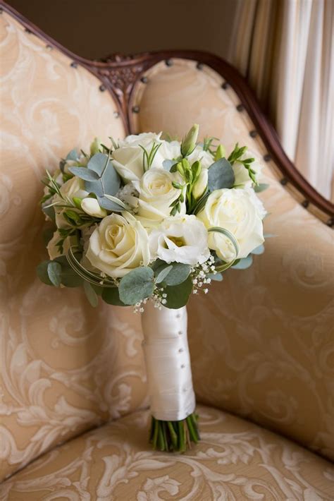 Beautiful Wedding Bouquet White Lisianthus Ivory Roses White Freesia