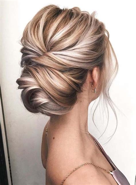 That, in fact, is the current trend, in no small thanks to dudes like justin bieber and the kid from 13 reasons why—although we're compelled to point out that eminem did it first (and best). 23 Gorgeous Knotted Blonde Updos for Women 2018. Searching ...