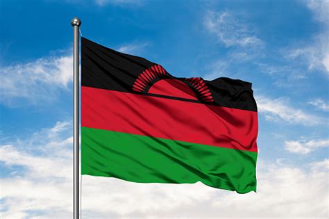 Foto De Bandeira Do Malawi Balançando Ao Vento Contra Branco Céu Azul