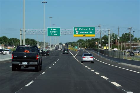 View Of The Overhead Signage And Accompanying Highway Off Ramp For