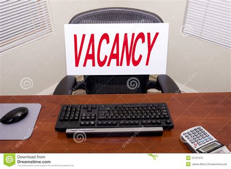 Desk and Vacancy Sign stock photo. Image of business - 12131376