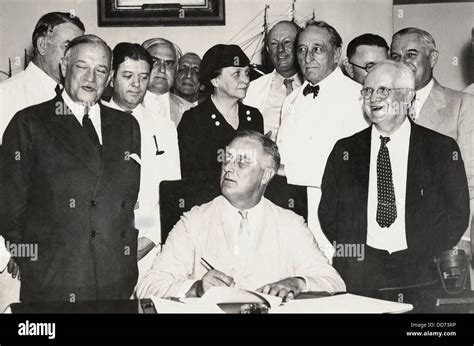 President Franklin Roosevelt Signing The Social Security Act Among