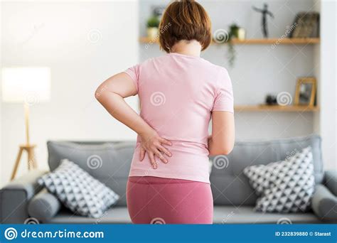 Back Pain Kidney Inflammation Woman Suffering From Backache At Home