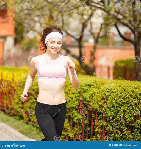 Young Happy Woman Jogging Along The Street Stock Image Image Of Smile