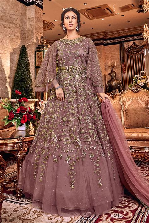 Many designers are launching their different styles and patterns. Pictures Of Latest Designer Suits Latest Suit Design 2020 ...