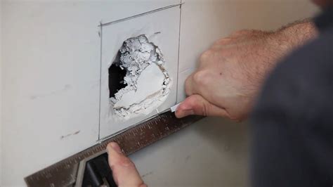 This is an important skill to have for that accident that is guaranteed to happen at some point in everyone's life. How to Fix a Hole in the Wall | EZ-Hang Door
