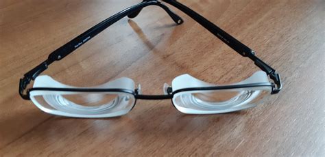 Extreme High Minus 28 Myodisc Glasses In A Black Metal Frame