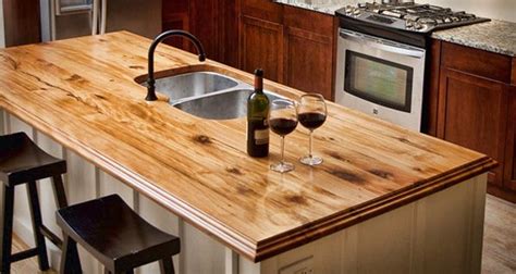 While you can do it yourself, it might not be bad. Heritage Wood Countertops | Atlanta Kitchen | Wooden countertops kitchen, Kitchen island ...