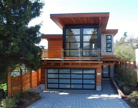 From starter house plans to executive home plans you can find that ultimate floor plan here. additions midcentury modern | Front view of modern house ...