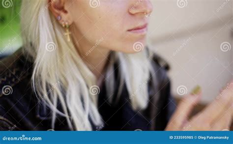 Blonde Freaky Girl Smoking Hand Rolled Cigarette Enjoying A Smoking