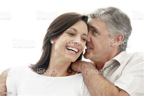 행복함 중년 남자 공유 비밀 그의 아내 속삭임에 대한 스톡 사진 및 기타 이미지 Istock