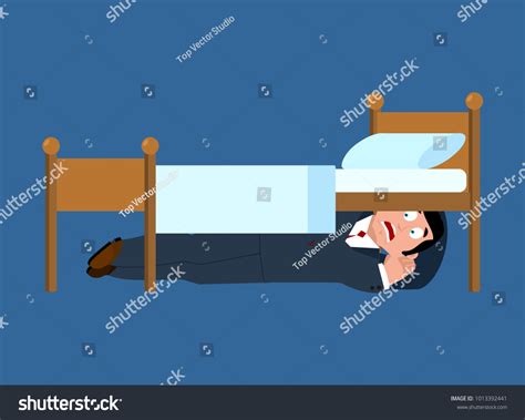 A Man Is Hiding Under The Bed Shutterstock