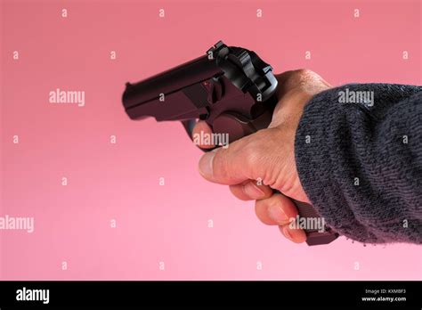 Male Hand With Gun Stock Photo Alamy