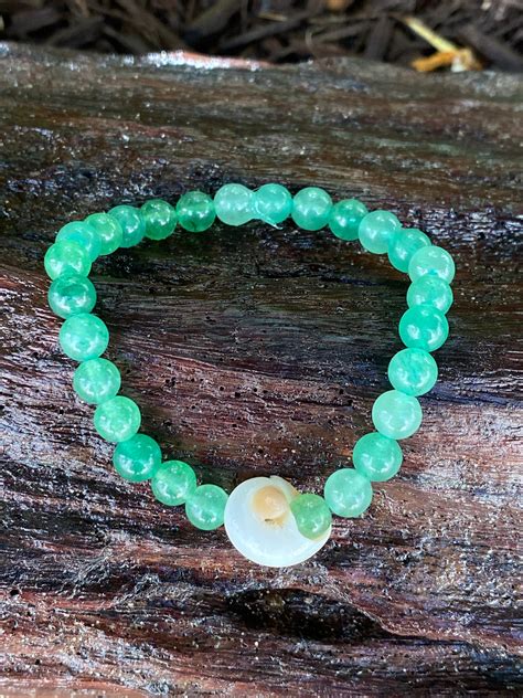 Green Aventurine Crystal Beaded Bracelet With A Moon Snail Seashell
