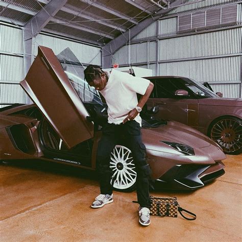 Spotted Travis Scott Shows Off His Lamborghini Aventador And Lv